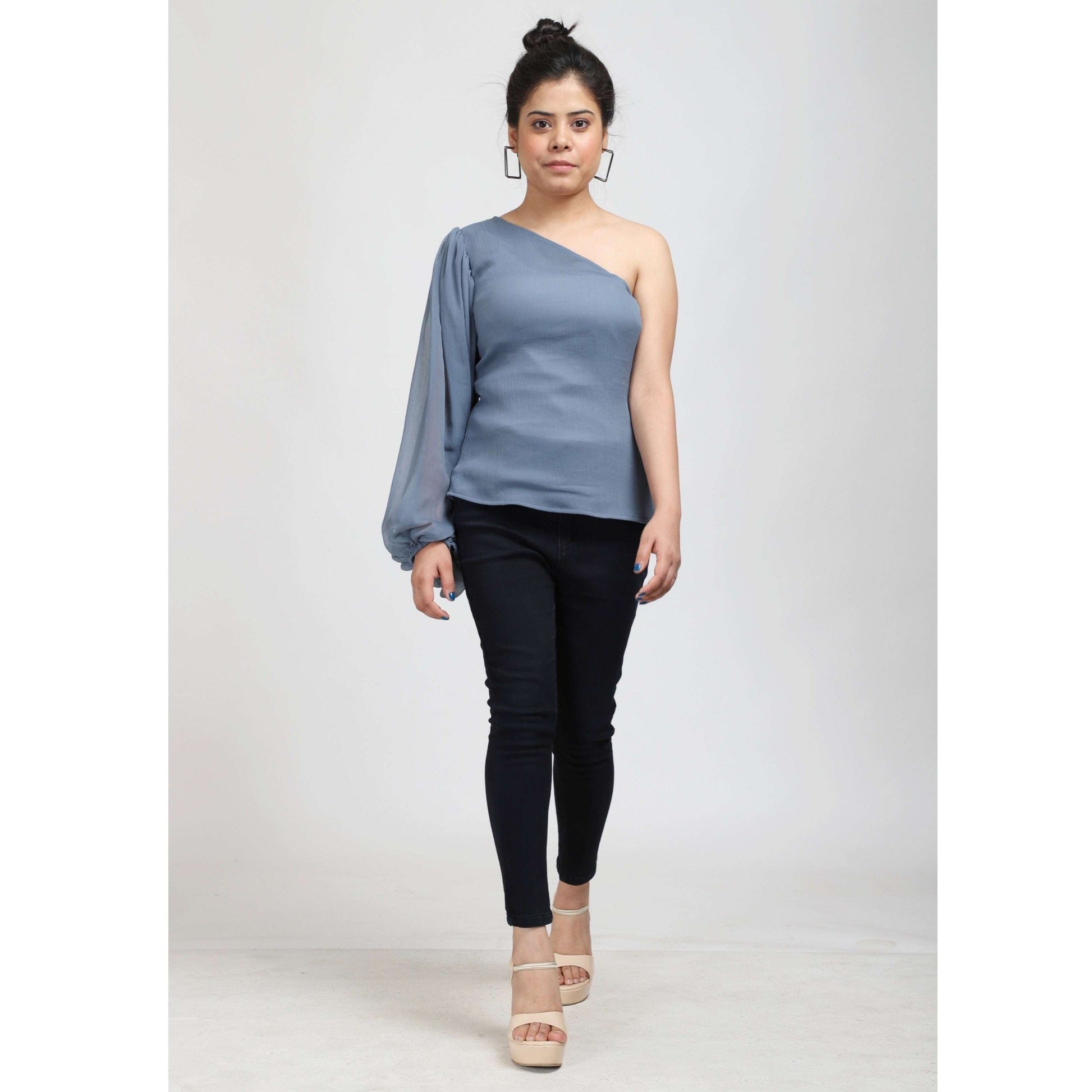 Elevate your style with the Pastel Blue One Shoulder Balloon Sleeve Top, now available at a special sale price at APEKSH. This chic top features a trendy one-shouldeshoulder balloon sleeve top