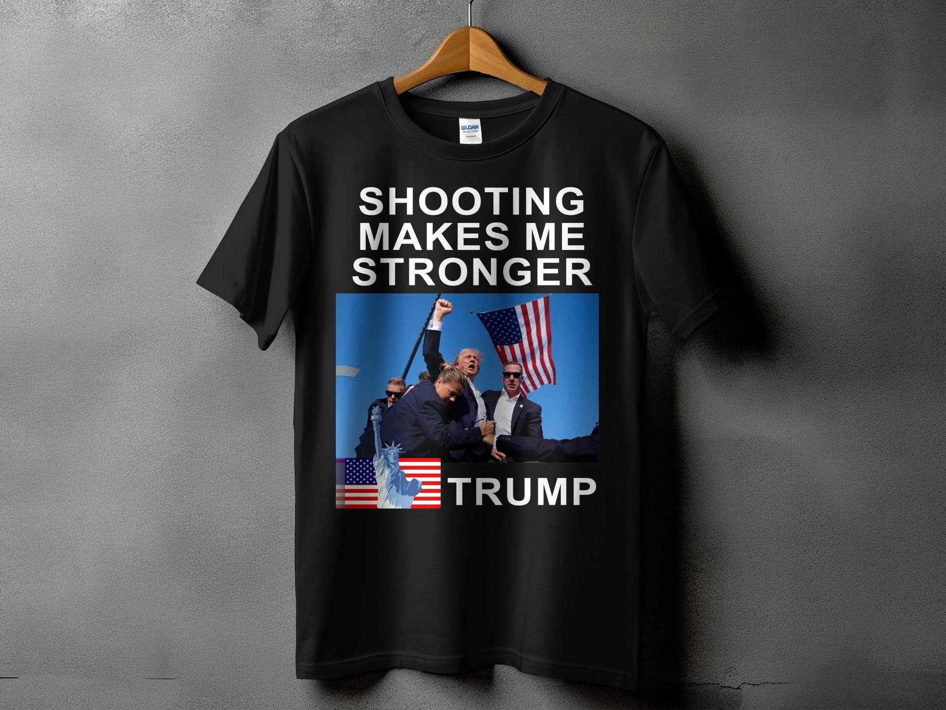 "Discover the VIRAL sensation: our exclusive half sleeve unisex T-shirt, meticulously crafted from 100% premium cotton for unparalleled comfort and durability. EmblaViral Trump Shooting