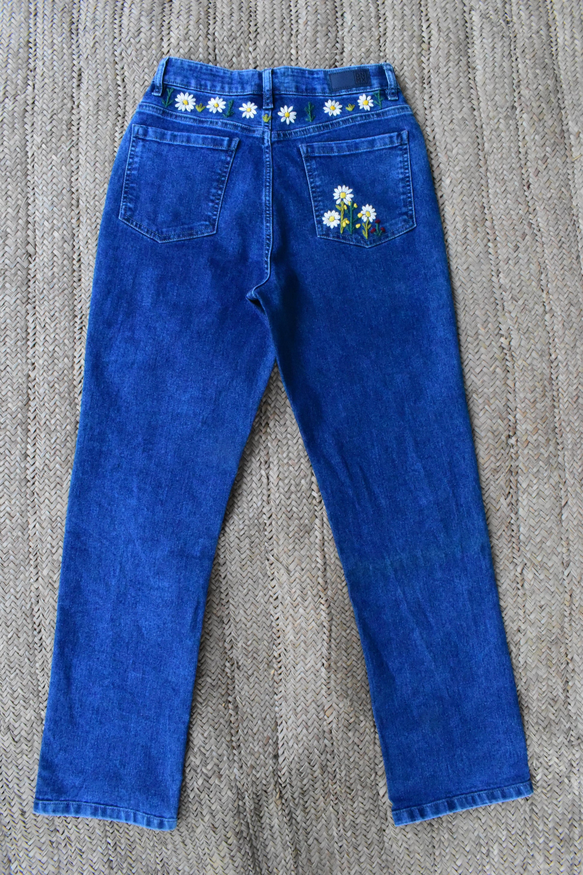 Product Description

To prolong the life of your denim garments, always wash them inside out at low temperature with similar colours. In this way, we can help reduceBlue Embroidered Jeans