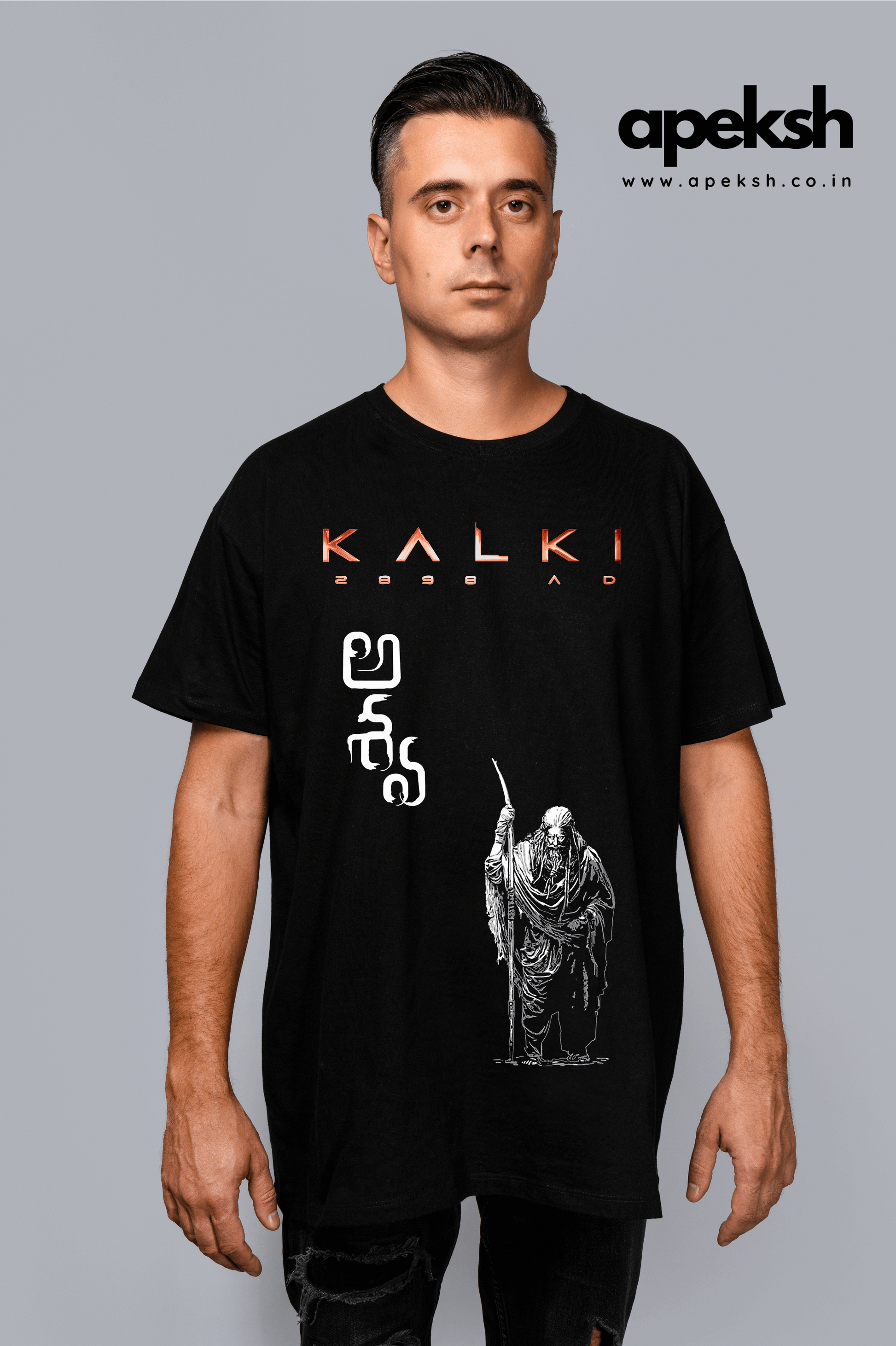 Embrace the mystique of ancient legend with our Oversized Black T-shirt, inspired by the epic tale of Kalki. Featuring bold Telugu lettering Ashwa on the front, symbKalki 2898 AD "Ashwa Saga" Black Oversized Tee